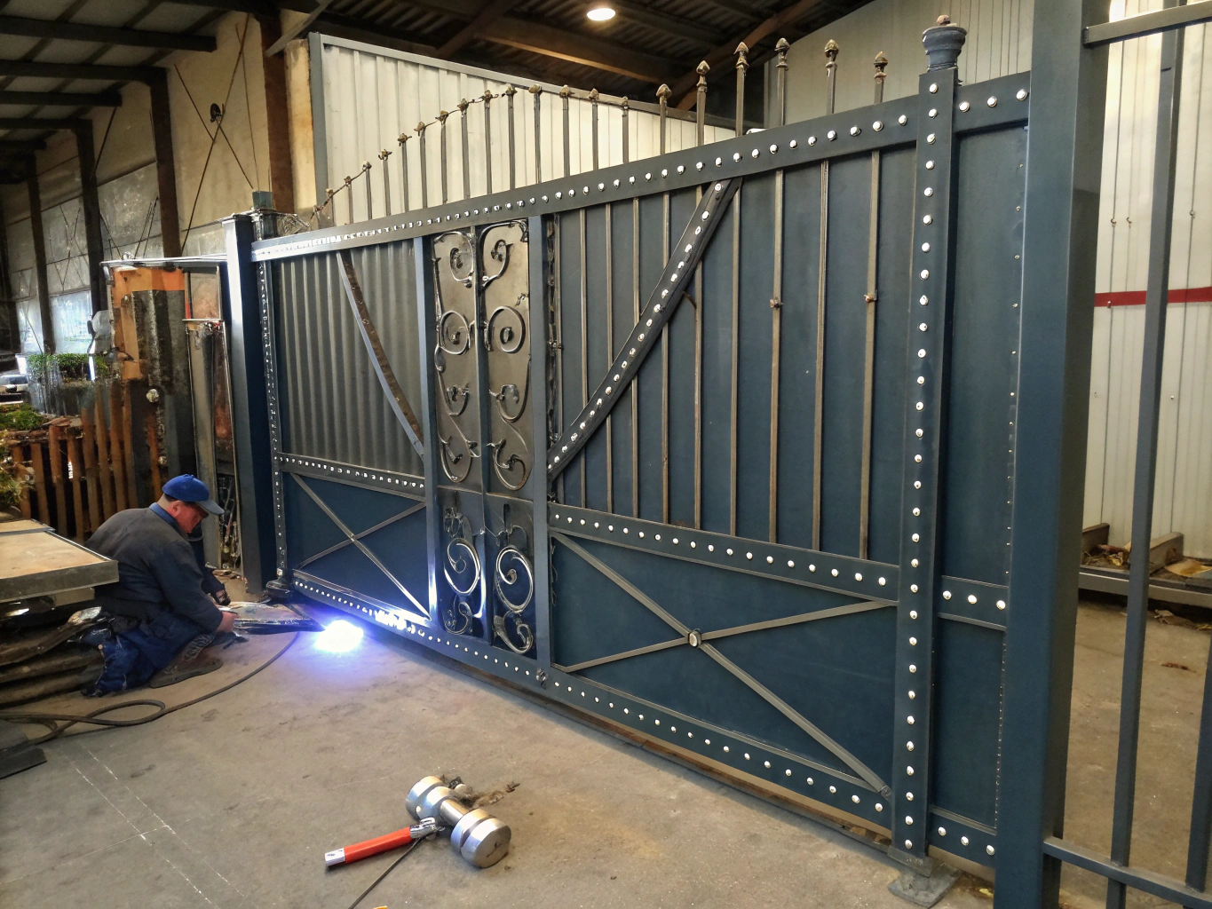 Solid steel security gate pivot hinge field rebuild weld